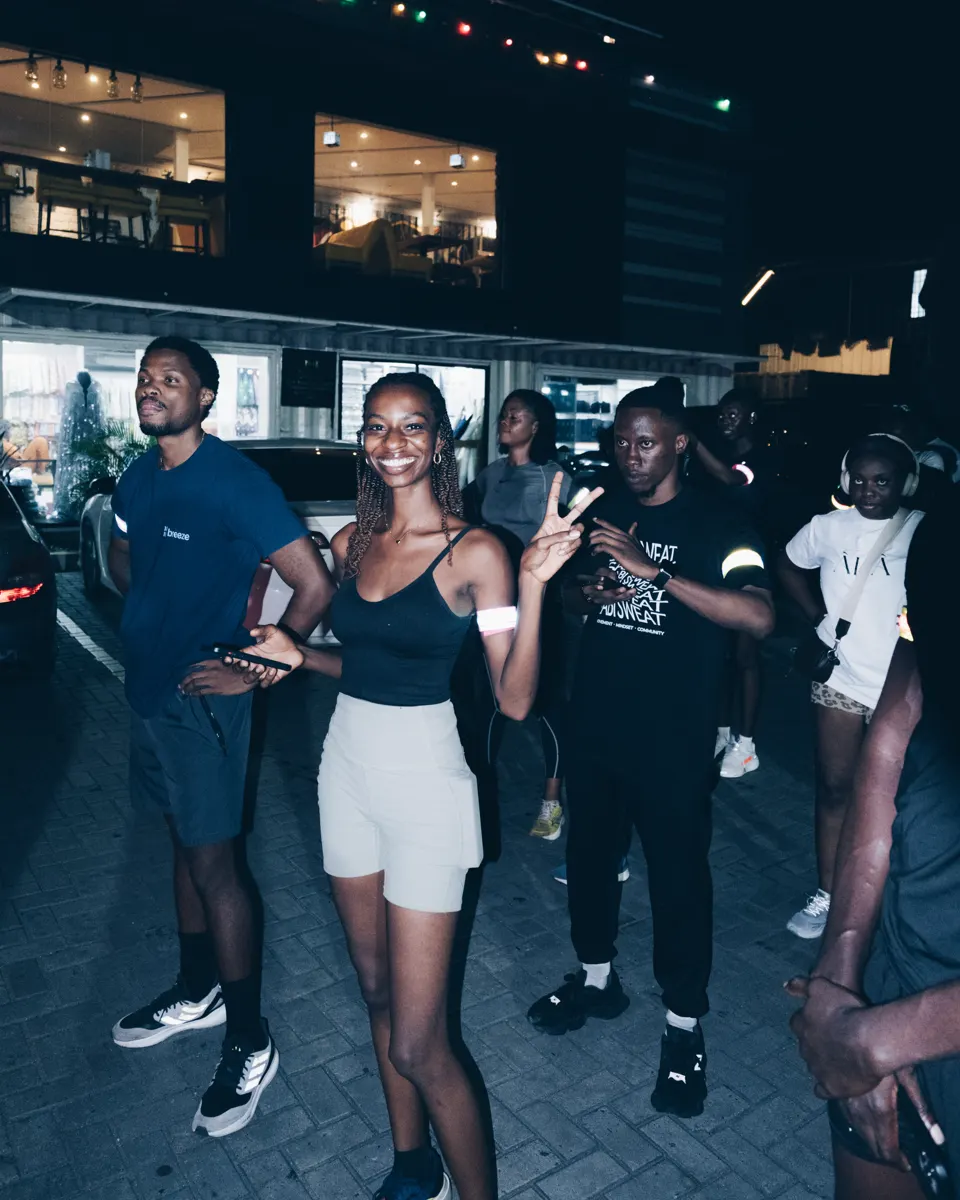 Members moving through the Lagos night together