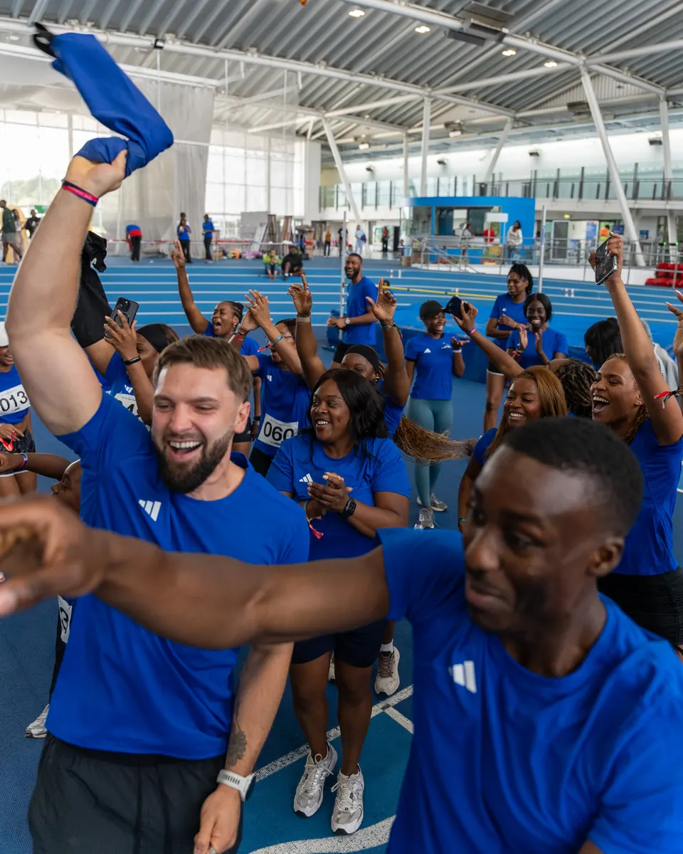 The Summer Games crowd cheering as winners are announced on the track